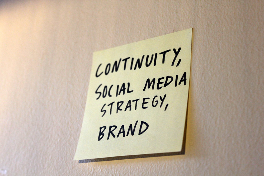 Post-it note of our keypoints; continuity, social media strategy, brand